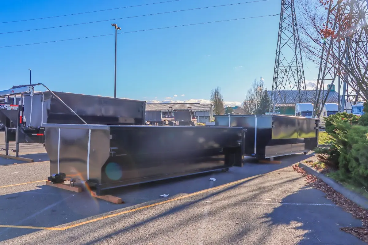 Roll-off dumpster ready for waste disposal at job site for Commercial Dumpster Rental in Yelm